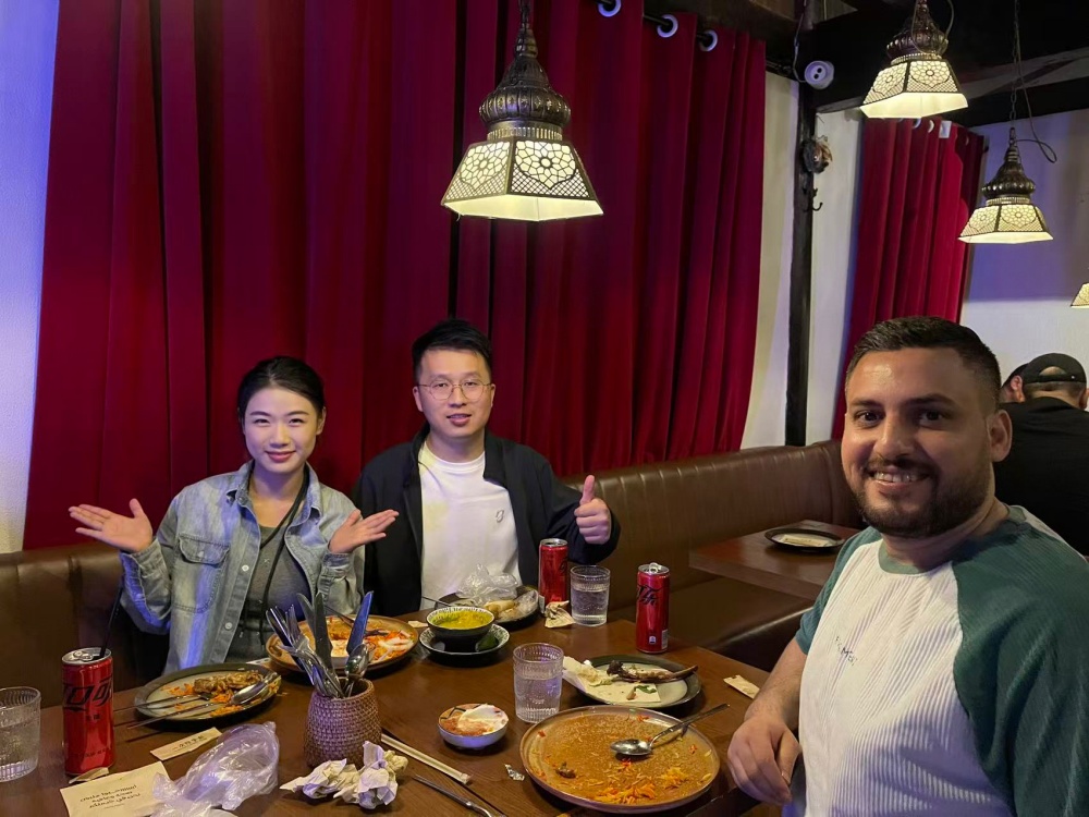 Aupeak sourcing team meeting an overseas client